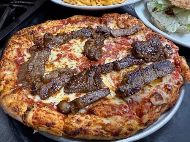 Signature Ribeye Steak Pizza — Where Steakhouse Meets Pizzeria