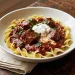 Slow-Simmered Hungarian Beef Goulash Served Over Egg Noodles